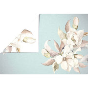 virágzó magnólia virágokkal és levelekkel díszített kétoldalas tányéralátét