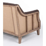 Loft stílusú, sötétbarna bőrrel kárpitozott kőrisfa kanapé nyitott oldala.