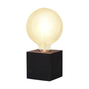 Fából készült, kocka formájú, fekete színű asztali dekorfoglalat.