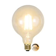 Clear Filament dekorációs izzó. Meleg fehér fényű LED dekorációs izzó áttetsző üveggel.