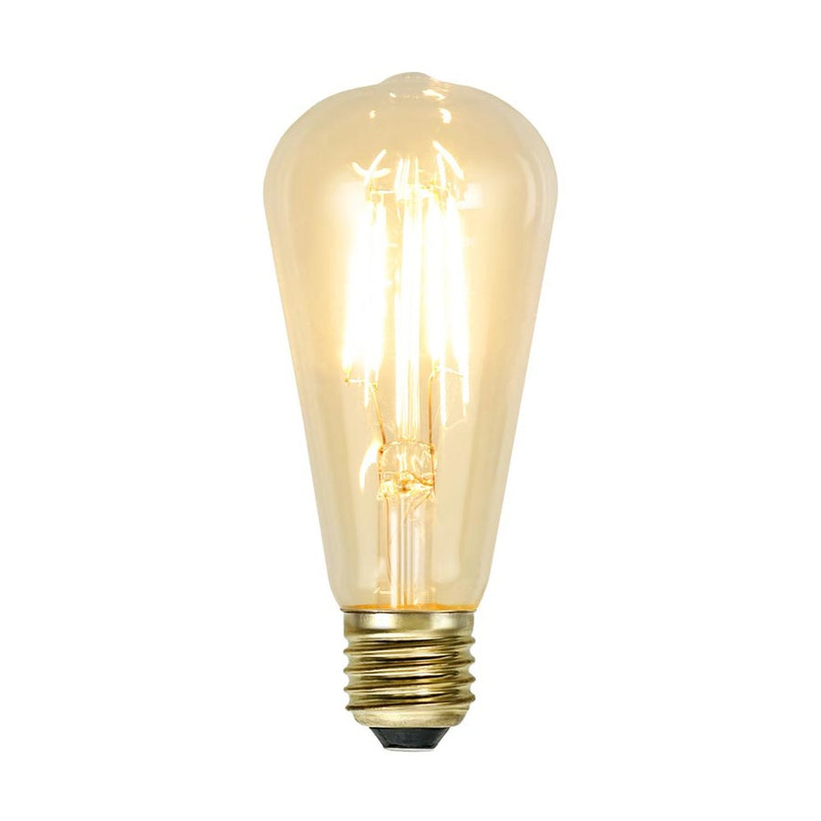 Clear Filament dekorációs izzó. Meleg fehér fényű LED dekorációs izzó áttetsző üveggel.