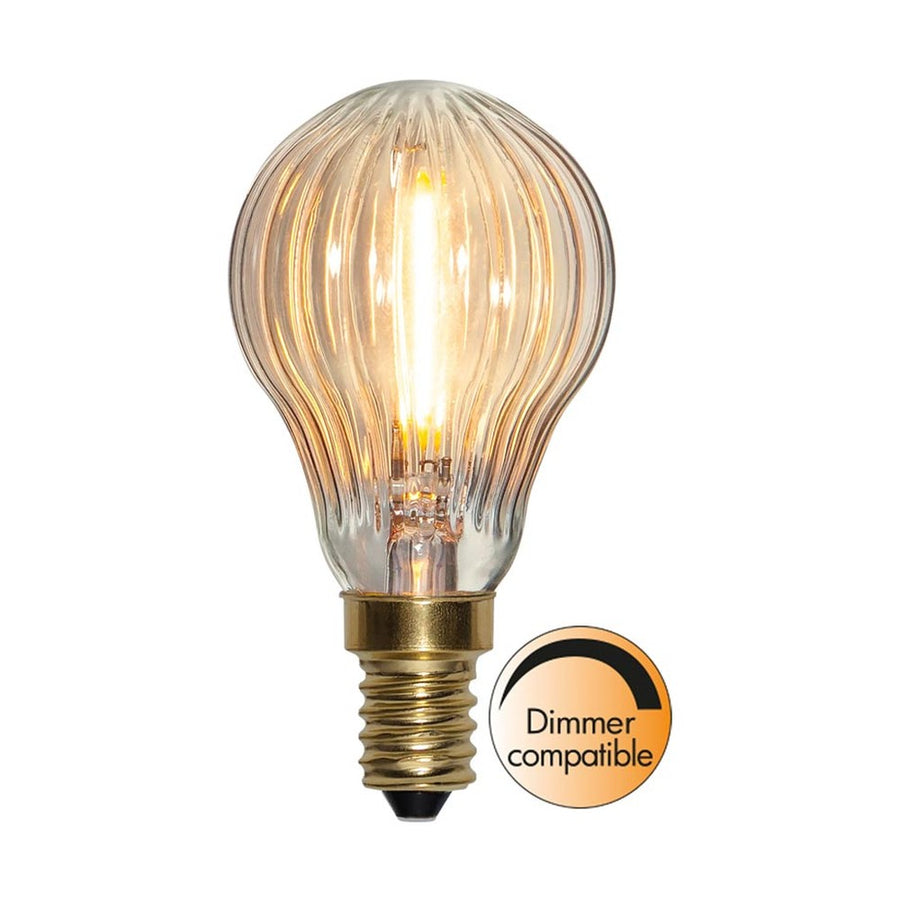 Clear Filament dekorációs izzó. Meleg fehér fényű LED dekorációs izzó áttetsző üveggel.