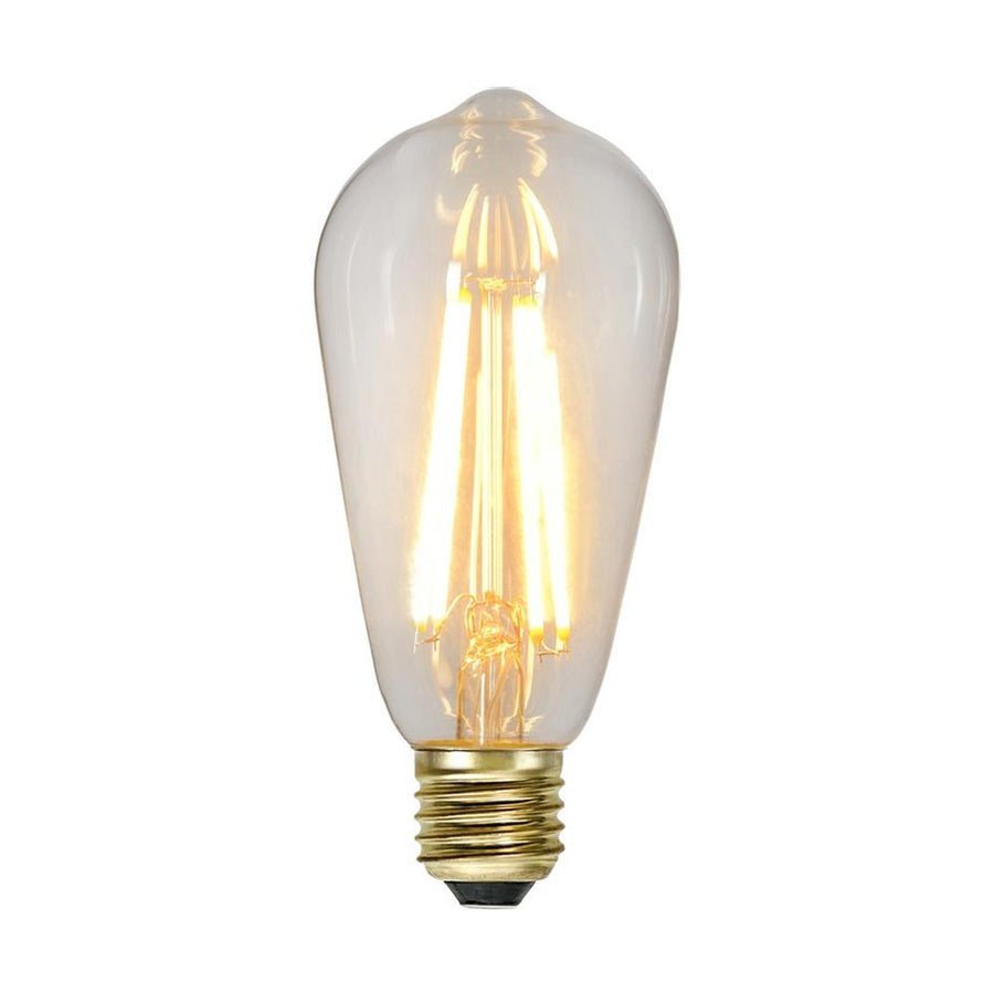 Clear Filament dekorációs izzó. Meleg fehér fényű LED dekorációs izzó áttetsző üveggel.