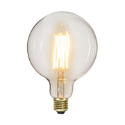 Clear Filament dekorációs izzó. Meleg fehér fényű LED dekorációs izzó áttetsző üveggel. 