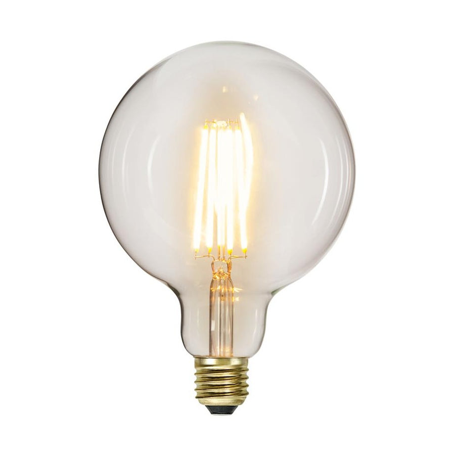 Clear Filament dekorációs izzó. Meleg fehér fényű LED dekorációs izzó áttetsző üveggel. 