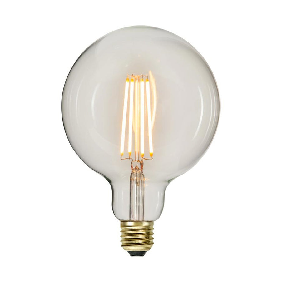 Clear Filament dekorációs izzó. Meleg fehér fényű LED dekorációs izzó áttetsző üveggel. 