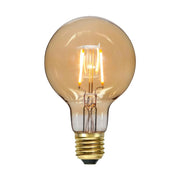 Amber Soft Glow vintage LED dekorációs izzó. Meleg fehér fényű, borostyánszín üveggel.