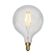 Clear Filament dekorációs izzó. Meleg fehér fényű LED dekorációs izzó áttetsző üveggel.