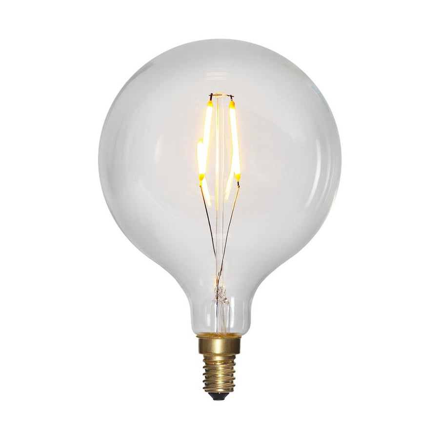 Clear Filament dekorációs izzó. Meleg fehér fényű LED dekorációs izzó áttetsző üveggel.