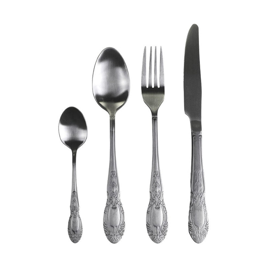 Ezüst színű, vintage stílusú, rozsdamentes acélból készült négydarabos evőeszközkészlet.