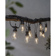 Kültéri LED dekorációs izzósor. 10 darab áttetsző búrás izzóval, fekete kábellel.