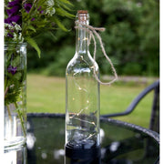 Áttetsző, napelemes palack-lámpás LED izzókkal.