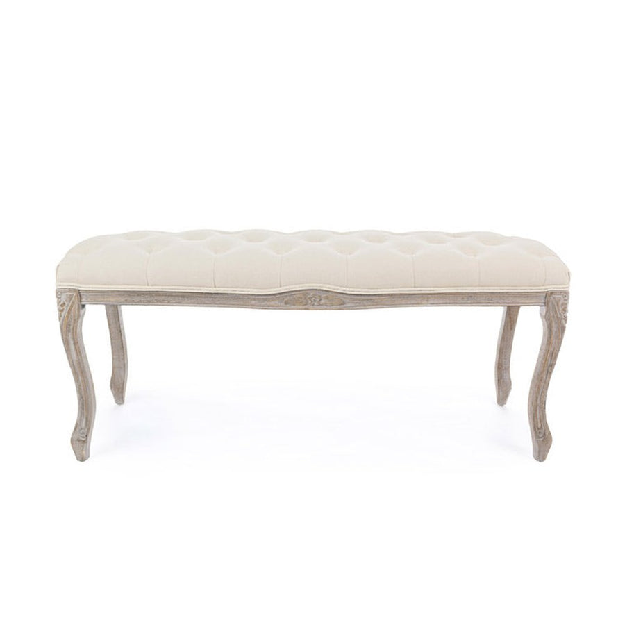 Koloniál stílusú, nyírfából és kaucsukfából készült, bézs színű, bársonyhatású textíliával kárpitozott kézműves ülőpad.