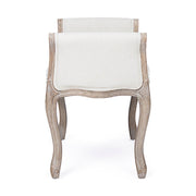 Koloniál stílusú, kaucsukfából készült, fehér színű textillel kárpitozott ülőpad karfával.