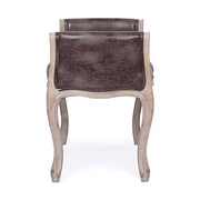 Koloniál stílusú, kaucsukfából készült, fekete műbőrrel kárpitozott ülőpad karfával.