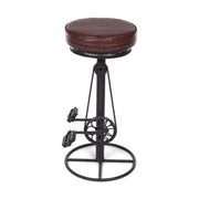 Ipari stílusú, fekete színű, fémből készült pedálos bárszék bőr ülőfelülettel.