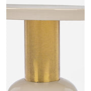 Kortárs, zománcozott acélból készült, krémfehér és arany színű kerek kisasztal.