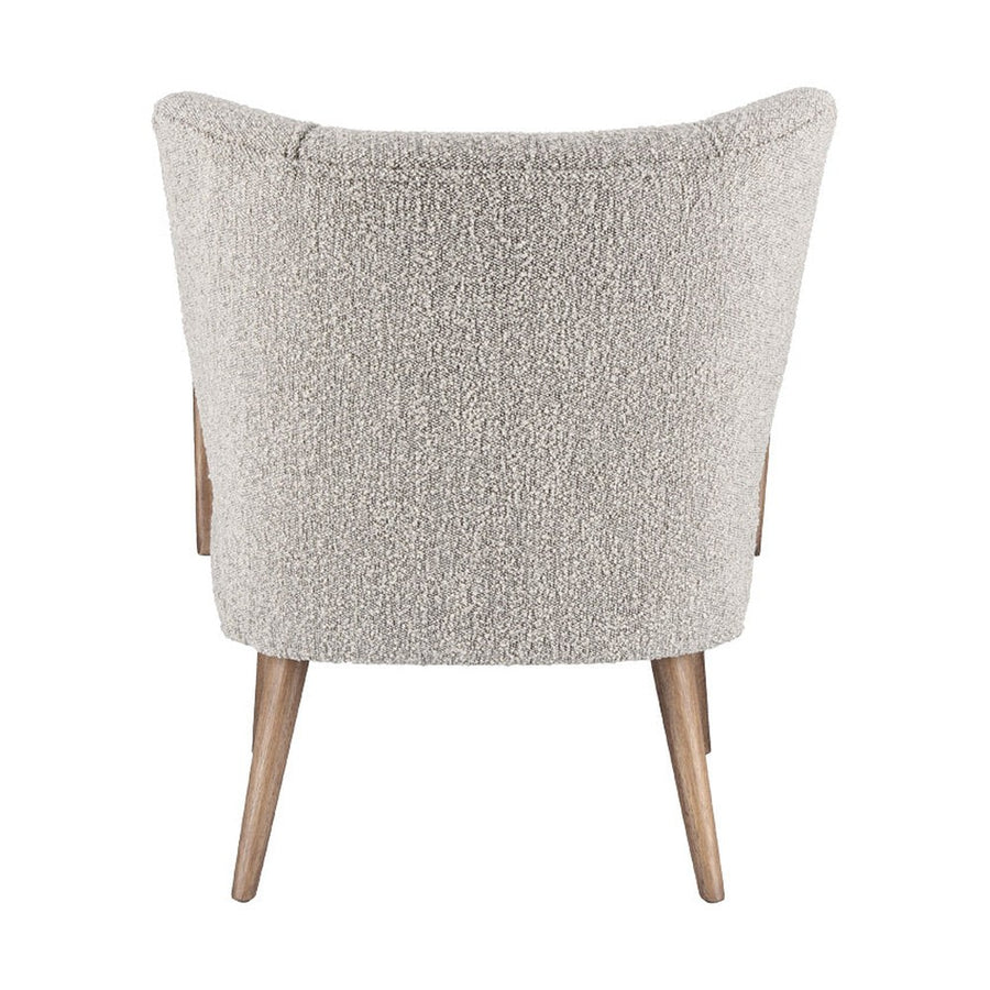 Retró stílusú, világosszürke szövettel kárpitozott kaucsukfa klubfotel.