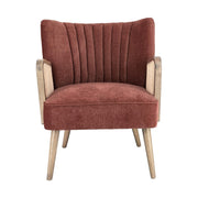 Retró stílusú, téglavörös színű bársonyhatású szövettel kárpitozott kaucsukfa klubfotel.