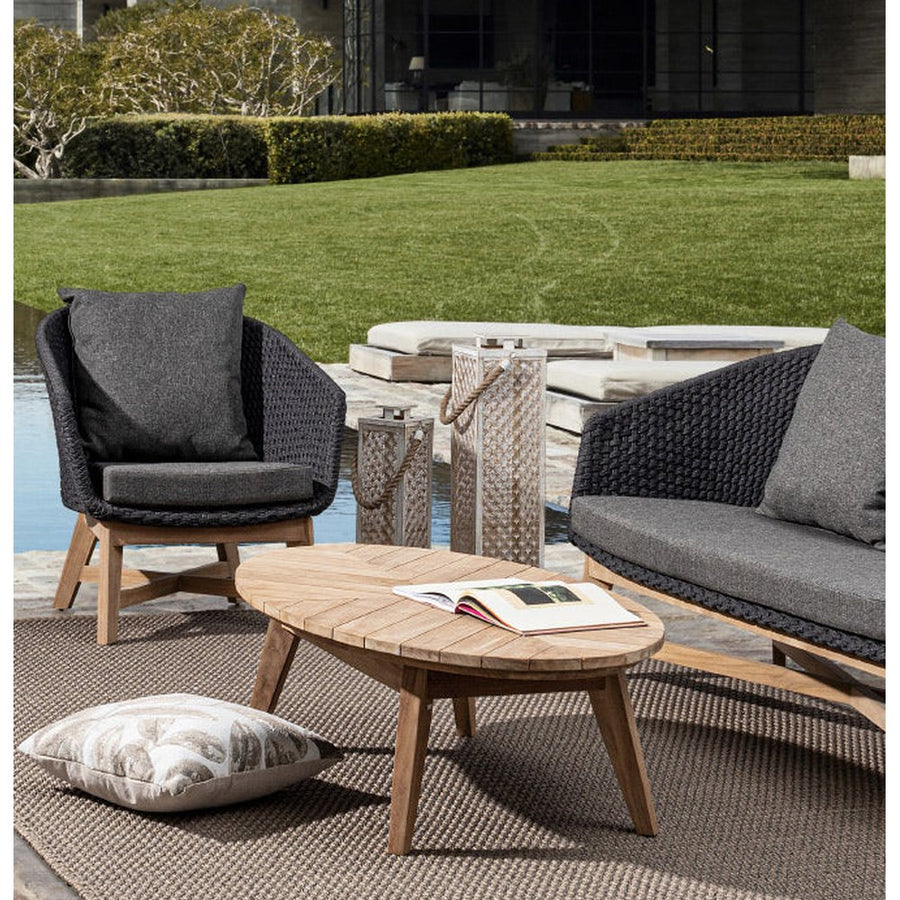 Prémium kategóriás, design kerti fotel sötétszürke színű párnákkal.