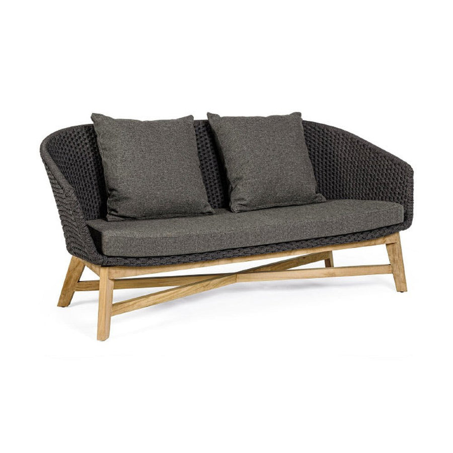 Prémium kategóriás, design kerti kanapé sötétszürke színű párnákkal.