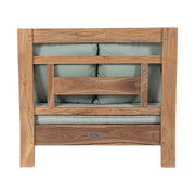 Keleti stílusú teakfa fotel hátoldala zöldeskék ülő- és hátpárnákkal.