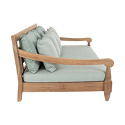 Keleti stílusú teakfa kanapé zöldeskék ülő- és hátpárnákkal.