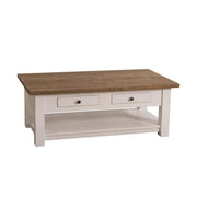 Klasszikus formatervezésű dohányzóasztal, két fiókkal, egy polccal. Színe: natúr és fehér.