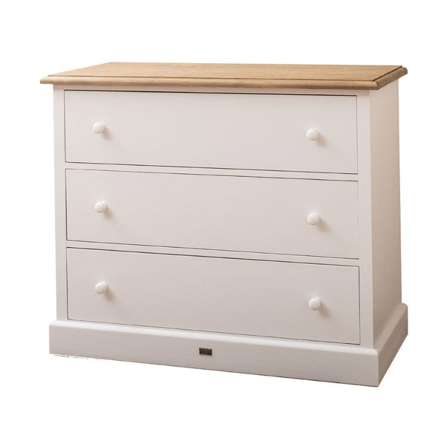 Fenyőfából készült, festett, fehér színű komód natúr színű fedlappal.