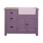 Fenyőfa mosogatószekrény, bal oldalán beépített, mély, négyszögletes kerámiakagylóval. A tárolsáról a bútor jobb oldalán elhelyzkedő két fiók, valamint ajtós táróló gondoskodik. A mosdókagyló alatt kétszárnyas ajtóval zárható tároló található. A bútor színe matt lila, a fedlap olajozott, natúr tölgyfa.