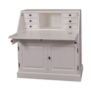 Fehér színű szekreter. A képen jól látható a lehajtható írópad, a hat kisebb és két nagyobb fiók, valamint az ajtós tároló.