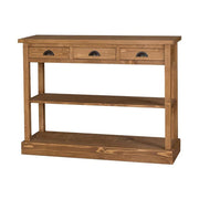 Country stílusú fenyőfa konzolasztal három fiókkal és két polccal. Színe: natúr.