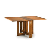 Loft stílusú, natúr szinű, mindifából készült összehajtható étkezőasztal.