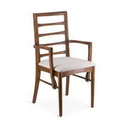 Modern stílusú, teakfából faragott, bézs színű szövettel kárpitozott kézműves karosszék.