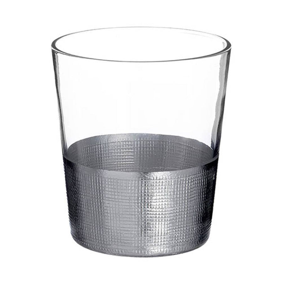 Modern, ezüstszínű fémmel díszített, röviditalos üveg pohár.