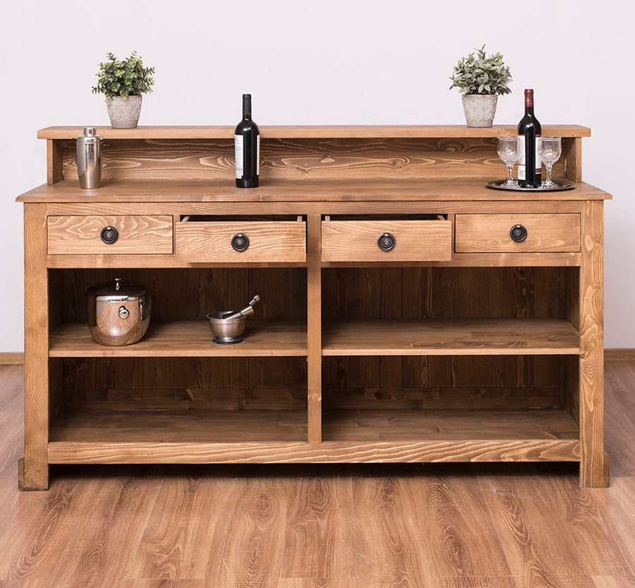 Nagyméretű, fenyőfa pult. A tárolásról négy polc, valamint négy fiók gondoskodik. Színe: viaszolt natúr.