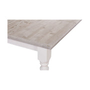 Fenyőfa étkezőasztal tölgyfa asztallappal, dekoratívan faragott lábakkal.