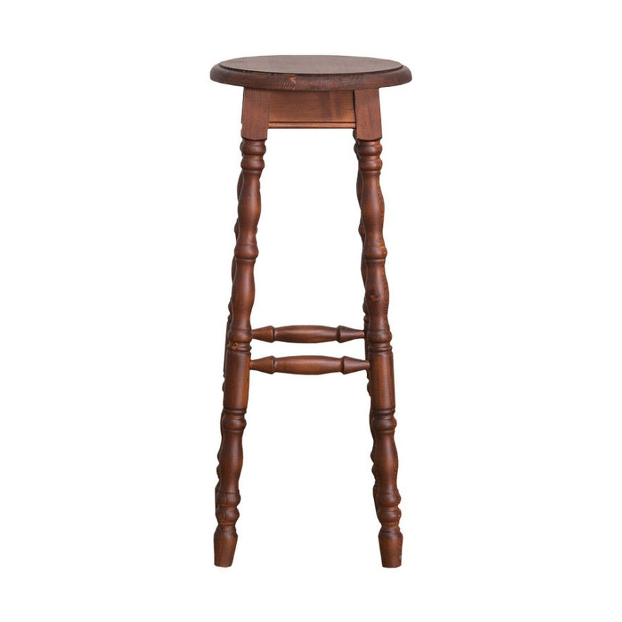 Klasszikus, kerek ülőfelülettel rendelkező, 82 cm magas bárszék dekoratív, faragott lábakkal.