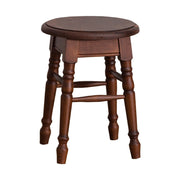 Klasszikus, kerek ülőfelülettel rendelkező hokedli, dekoratív, faragott lábakkal.