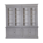 Prémium fenyőfa vitrin-könyvszekrény két darab kétszárnyú üveges ajtóval a felső részen, két darab kétszárnyú ajtóval az alsó részen. A bútor külső színe szürke, belül világos szürke.