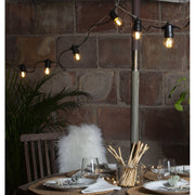 Meleg fehér fényű, kisfeszültségű LED dekorációs izzó borostyán üveggel.