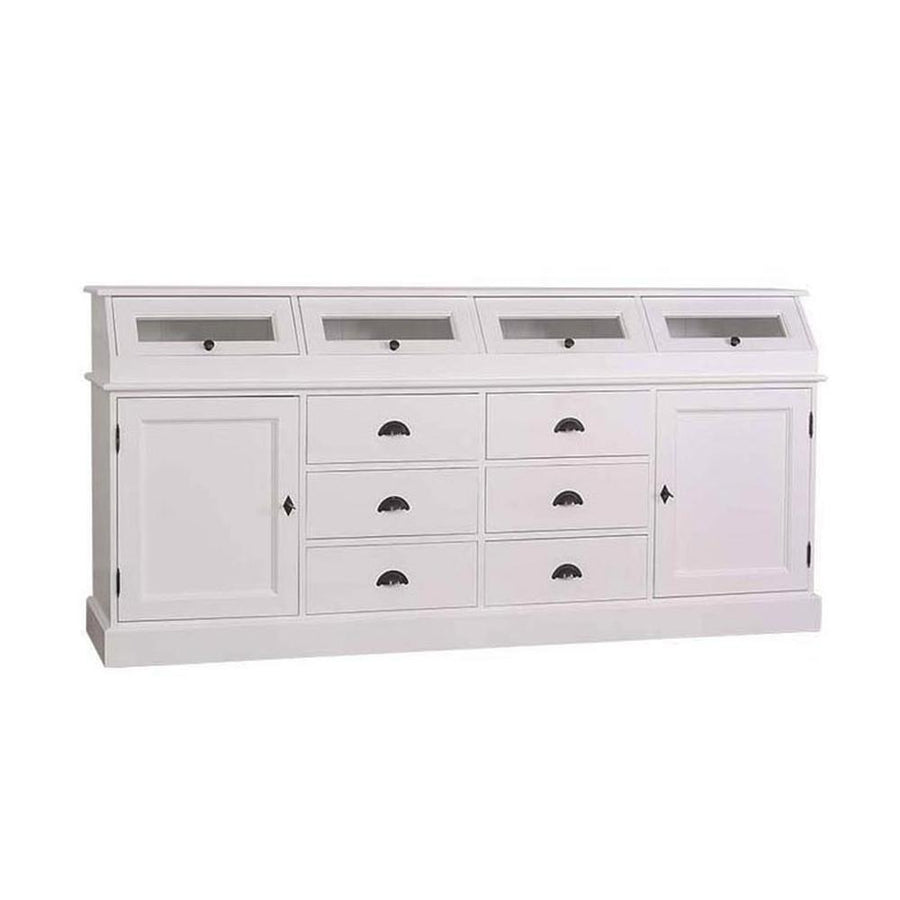 Fehér színű fenyőfa tálalókomód hat fiókkal, két ajtós tárólóval és négy vitrines tárolóval.