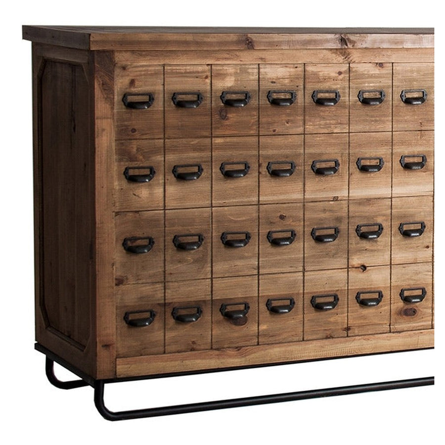 A pult külső oldalát hetvenkét fekete, fémfogantyúval díszített fiók teszi látványossá, de ezek valóban csak díszek. 