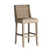 Koloniál stílusú, fenyőfából készült bárszék natúr színű vászon kárpitozással.