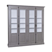 Impozáns fenyőfa könyvszekrény, két darab kétszárnyú ajtóval, melyek mindegyike kétharmad részt üvegezett. A bútor külső színe antikolt szürke, belül fehér.