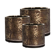 Aranyszínű dombormintával díszített, modern, glamour stílusú kerámia kaspó.