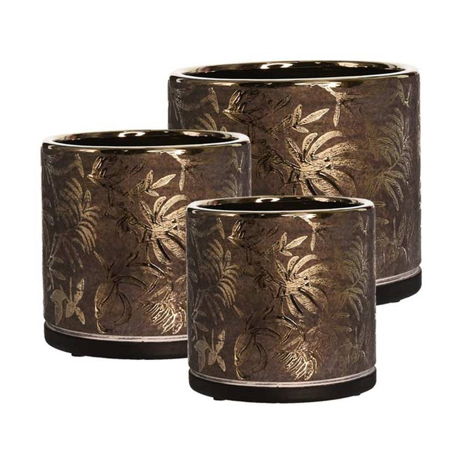 Aranyszínű dombormintával díszített, modern, glamour stílusú kerámia kaspó.