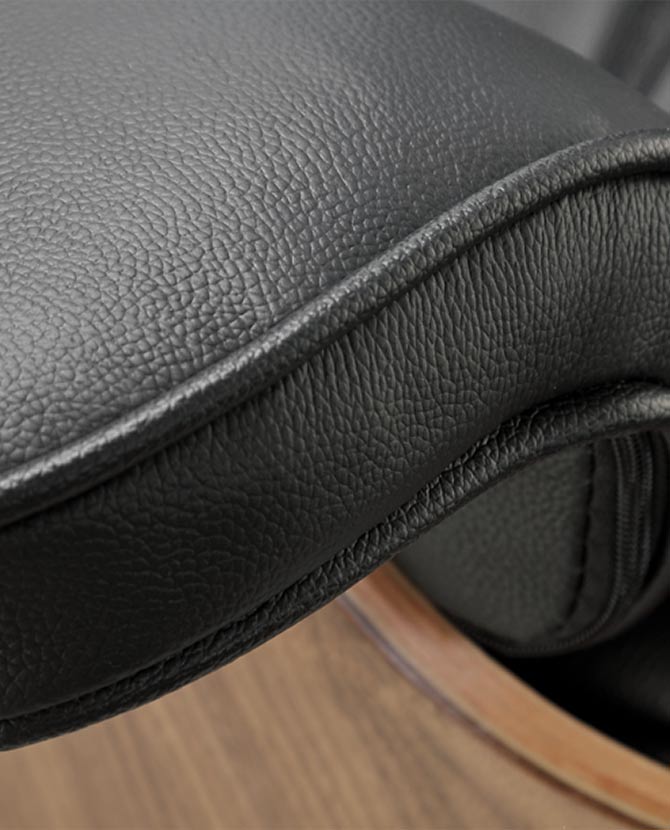 Eames Lounge Chair inspirálta pihenő fotel dió furnér fafelülettel, bőr kárpittal.