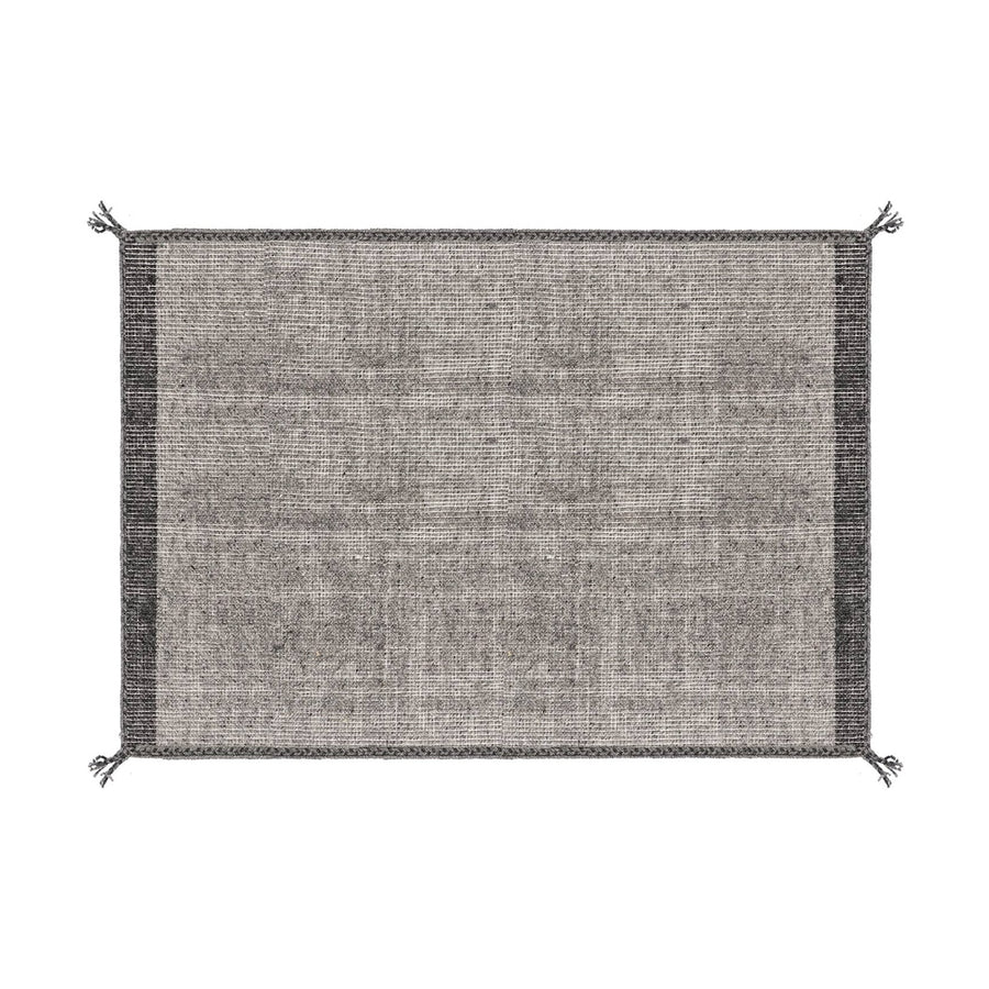 Szürke gyapjú szőnyeg.