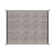 Szürke gyapjú szőnyeg.